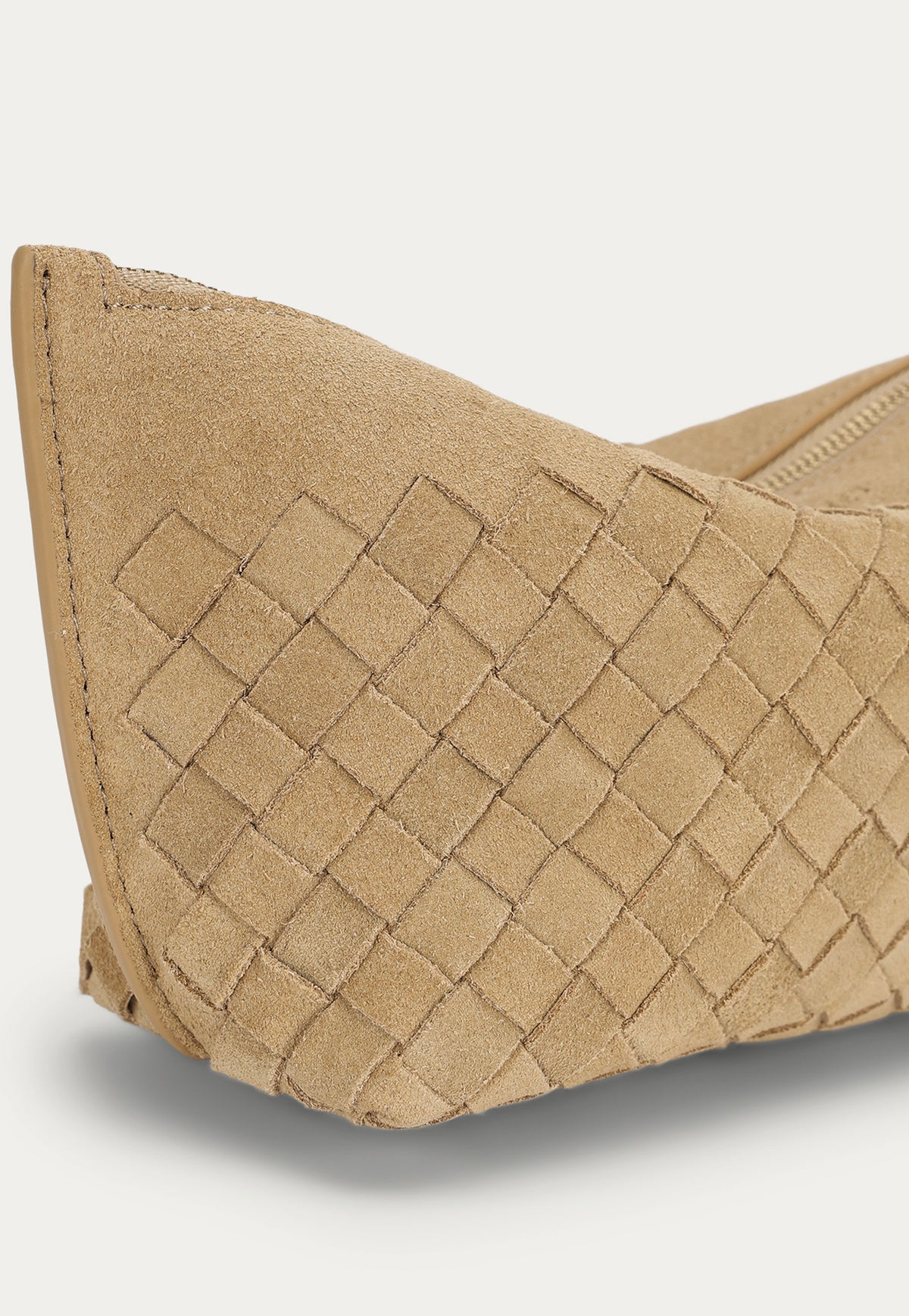 Close-up of the woven calf suede texture on the Deadly Ponies Medium Poucher in Oat.