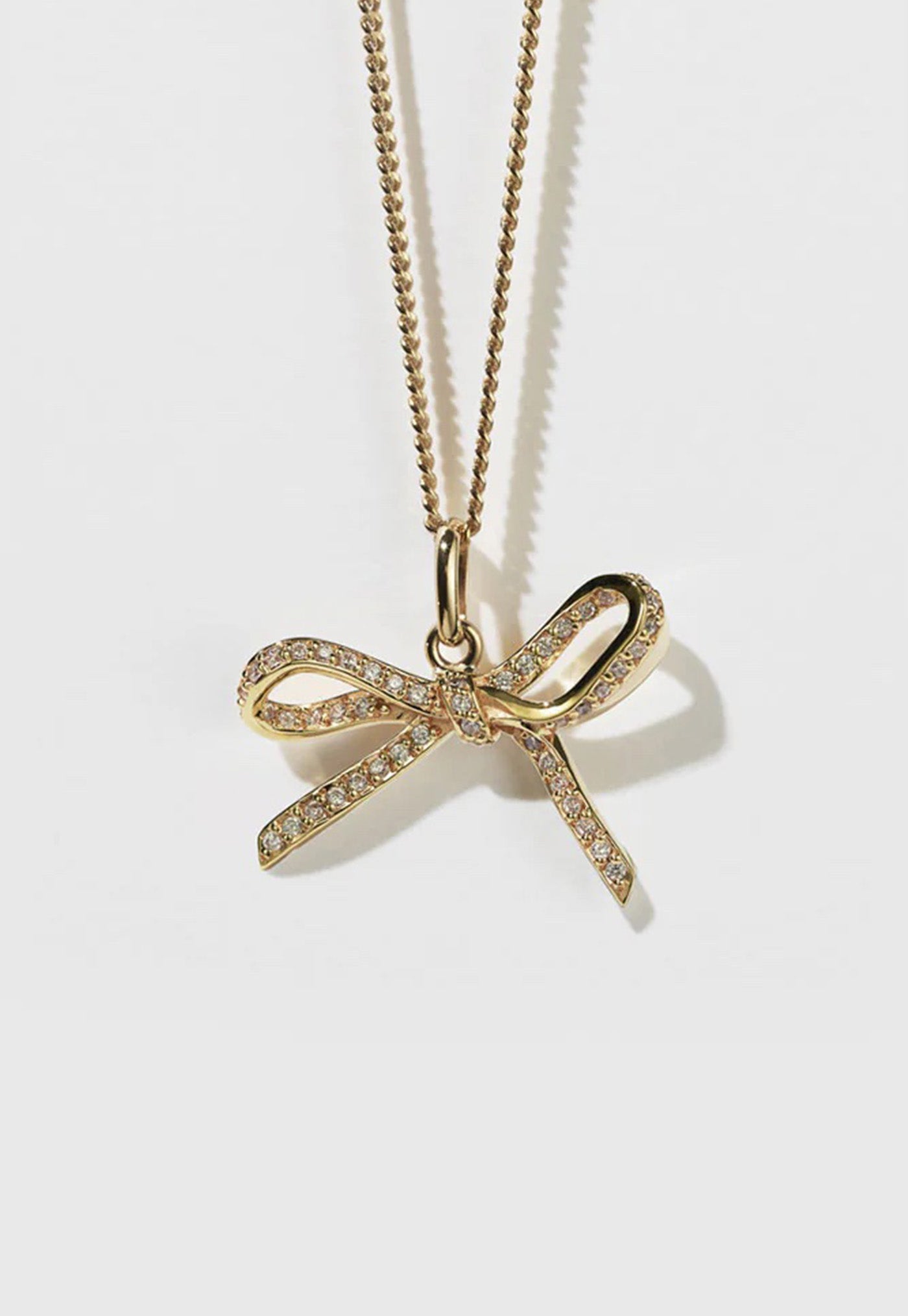 White Diamond Bow Necklace sold by Angel Divine