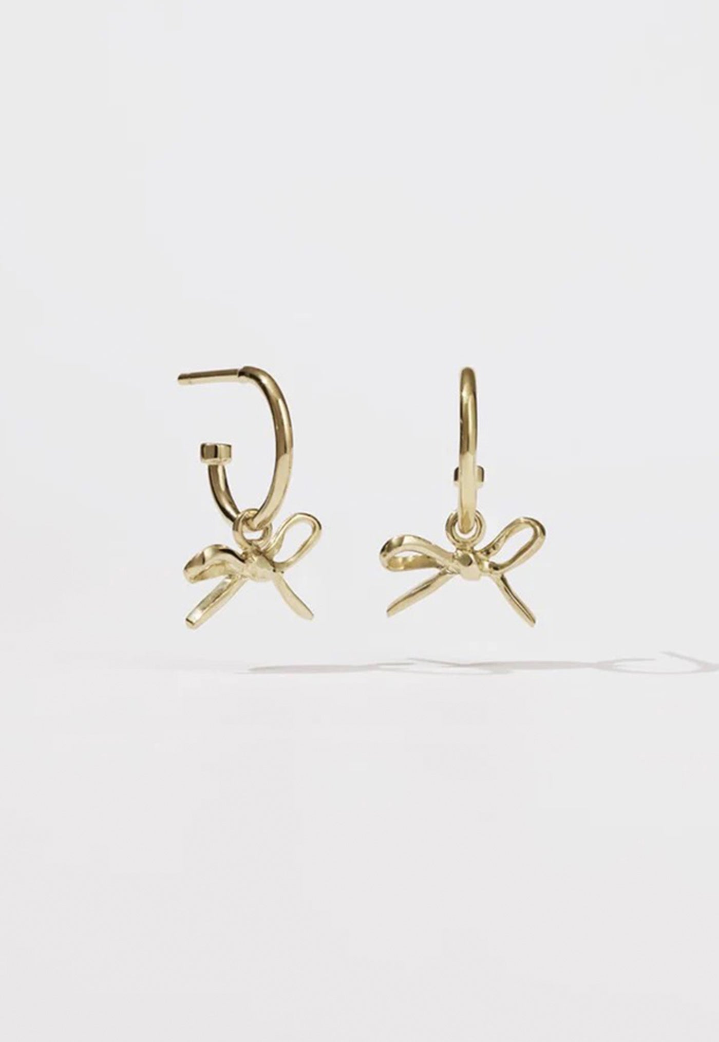 Bow Signature Hoops sold by Angel Divine