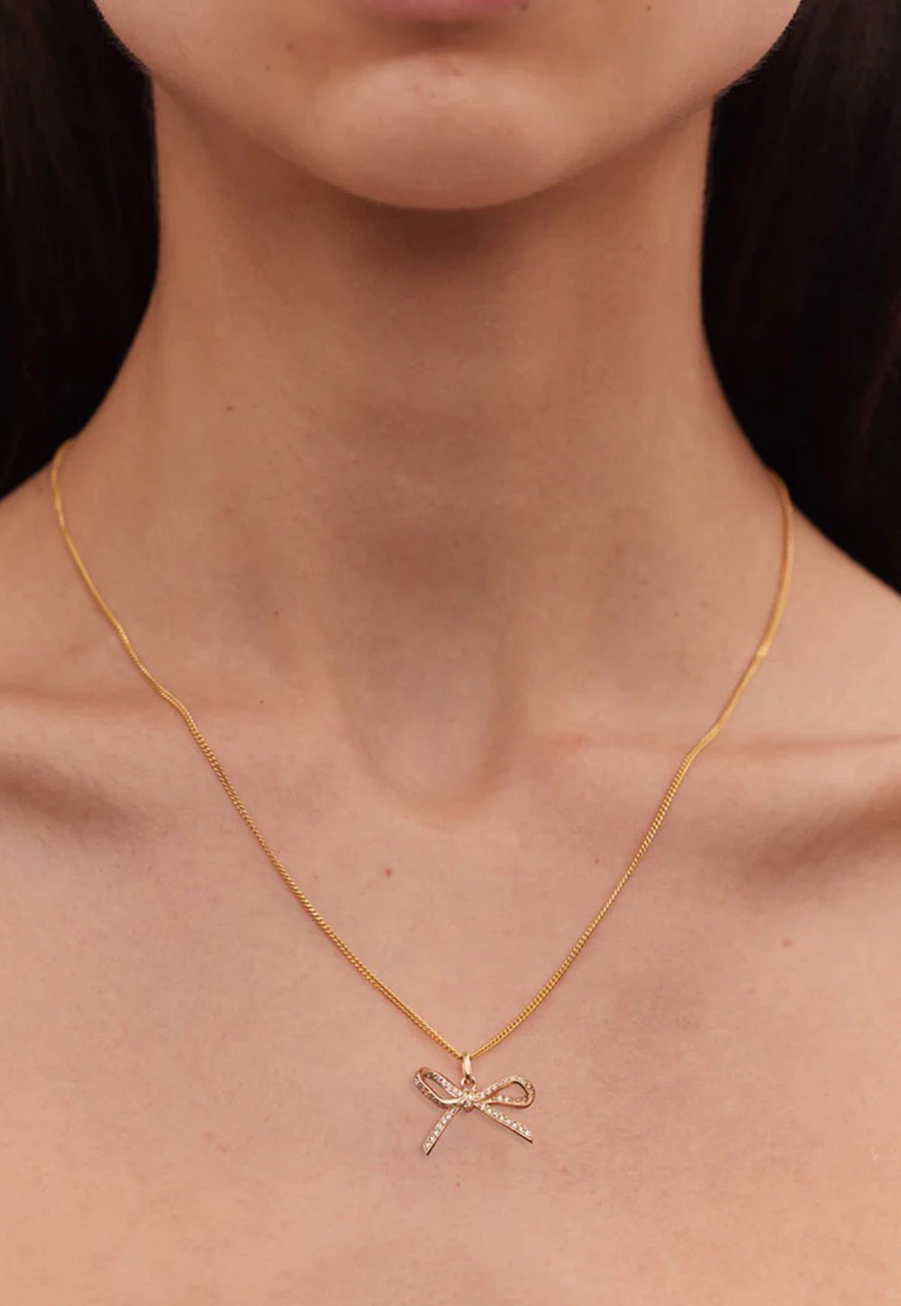 White Diamond Bow Necklace sold by Angel Divine