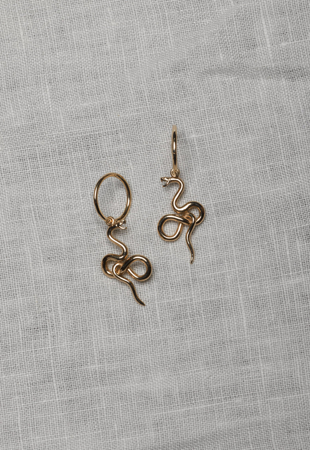 Medusa Signature Hoop Earrings sold by Angel Divine