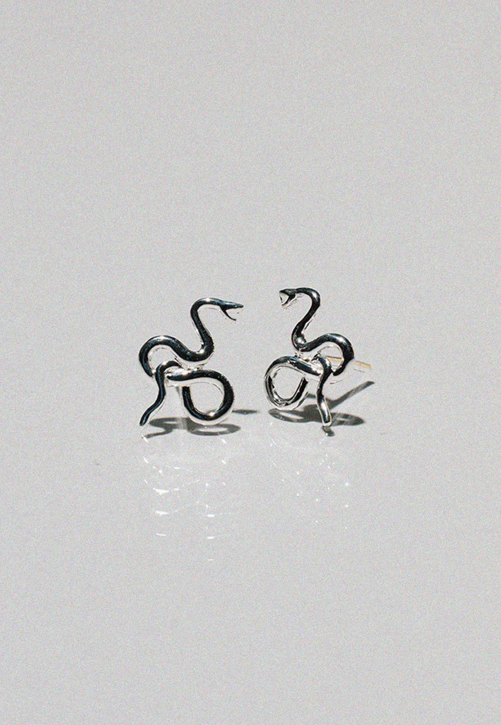 Medusa Stud Earrings sold by Angel Divine