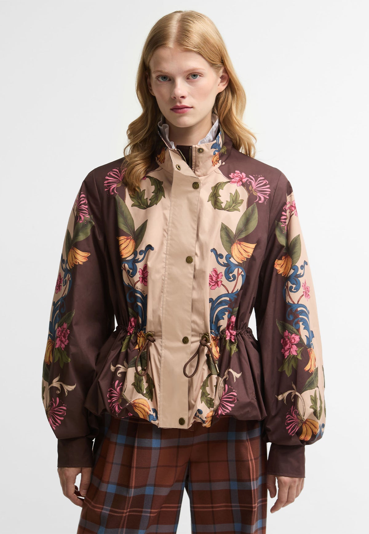 Barbour x FARM Rio Mandevilla Funnel Neck Peplum Jacket in Bloom In Between, a cream and brown floral banana print funnel neck jacket with flared peplum.