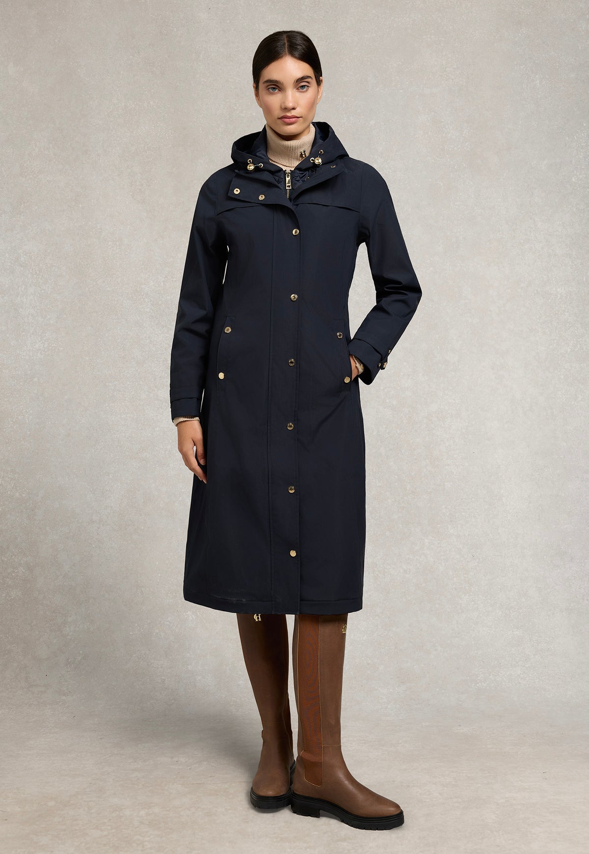 Holland Cooper Folgate waterproof rain coat in Ink Navy, front view with gold-tone hardware.