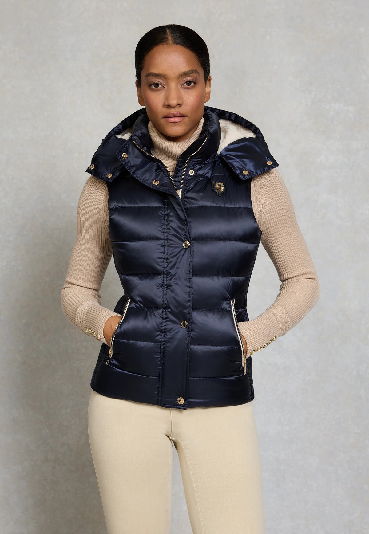 Holland Cooper Harlow Sherpa Gilet in Ink Navy, navy quilted gilet with sherpa lining and faux leather trim