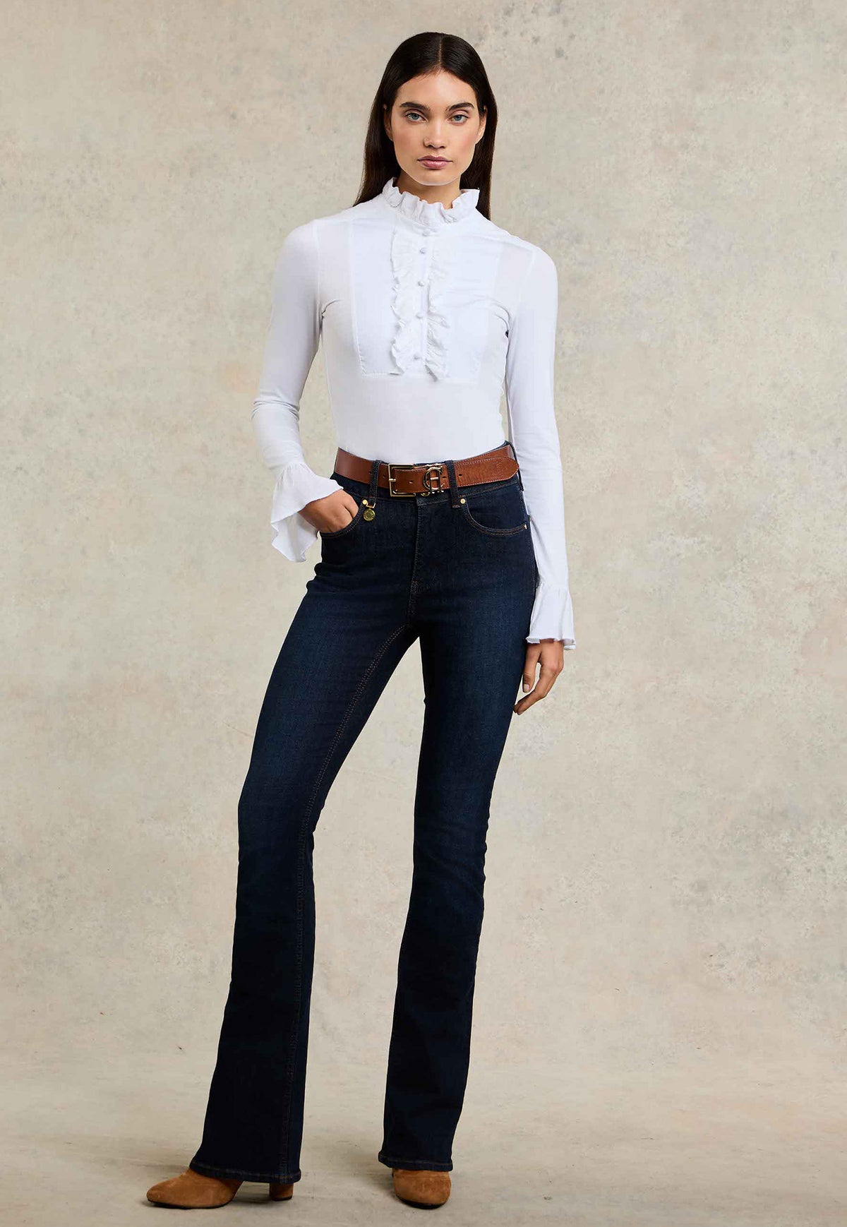 Holland Cooper High Rise Flared Jean in Deep Indigo, dark blue high rise stretch flared jeans with gold crested hardware.