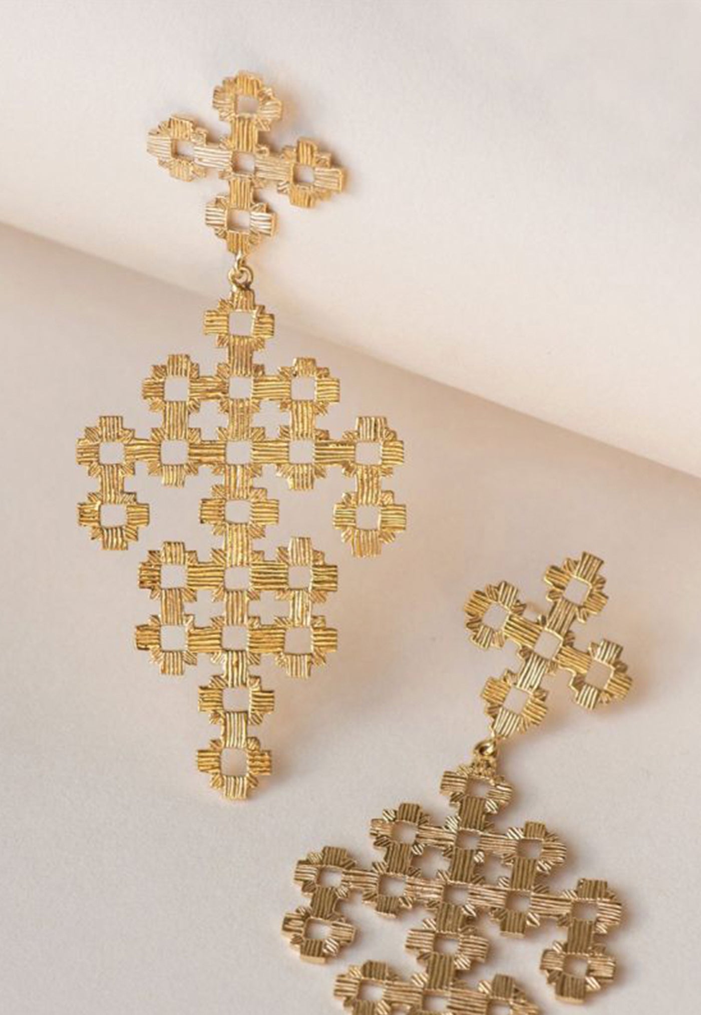 Chimi Earrings sold by Angel Divine