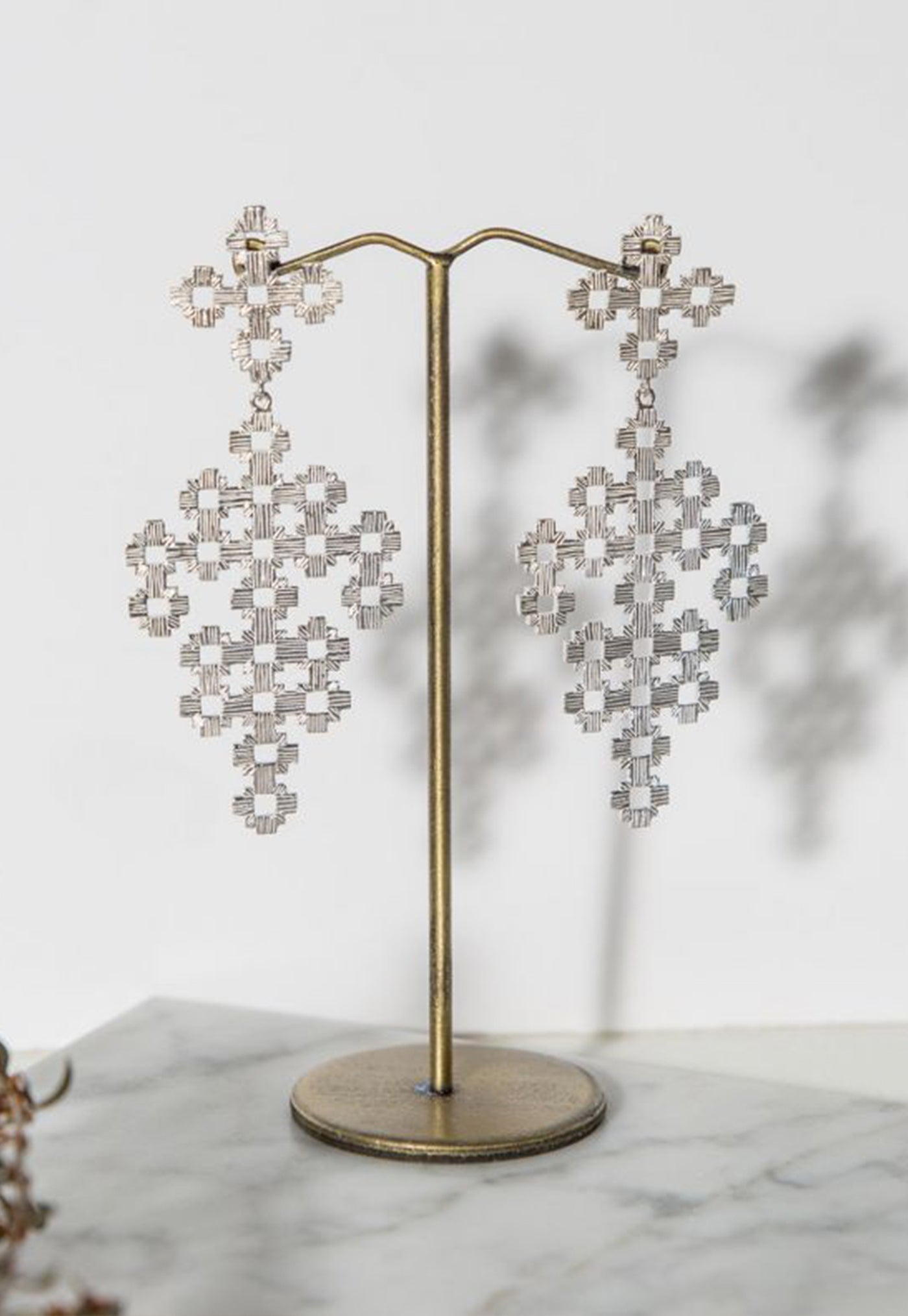 Chimi Earrings sold by Angel Divine