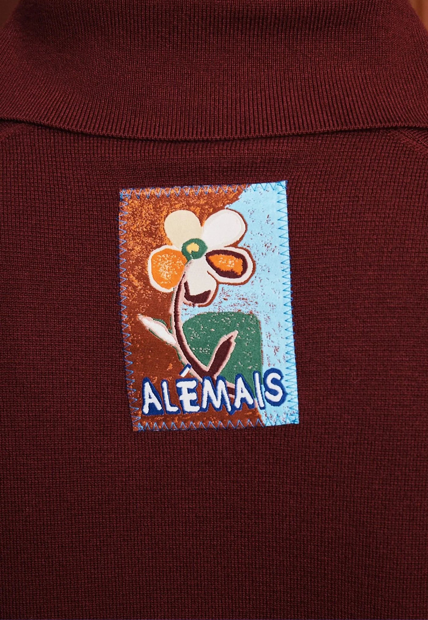 Claudia Plum Knit Polo