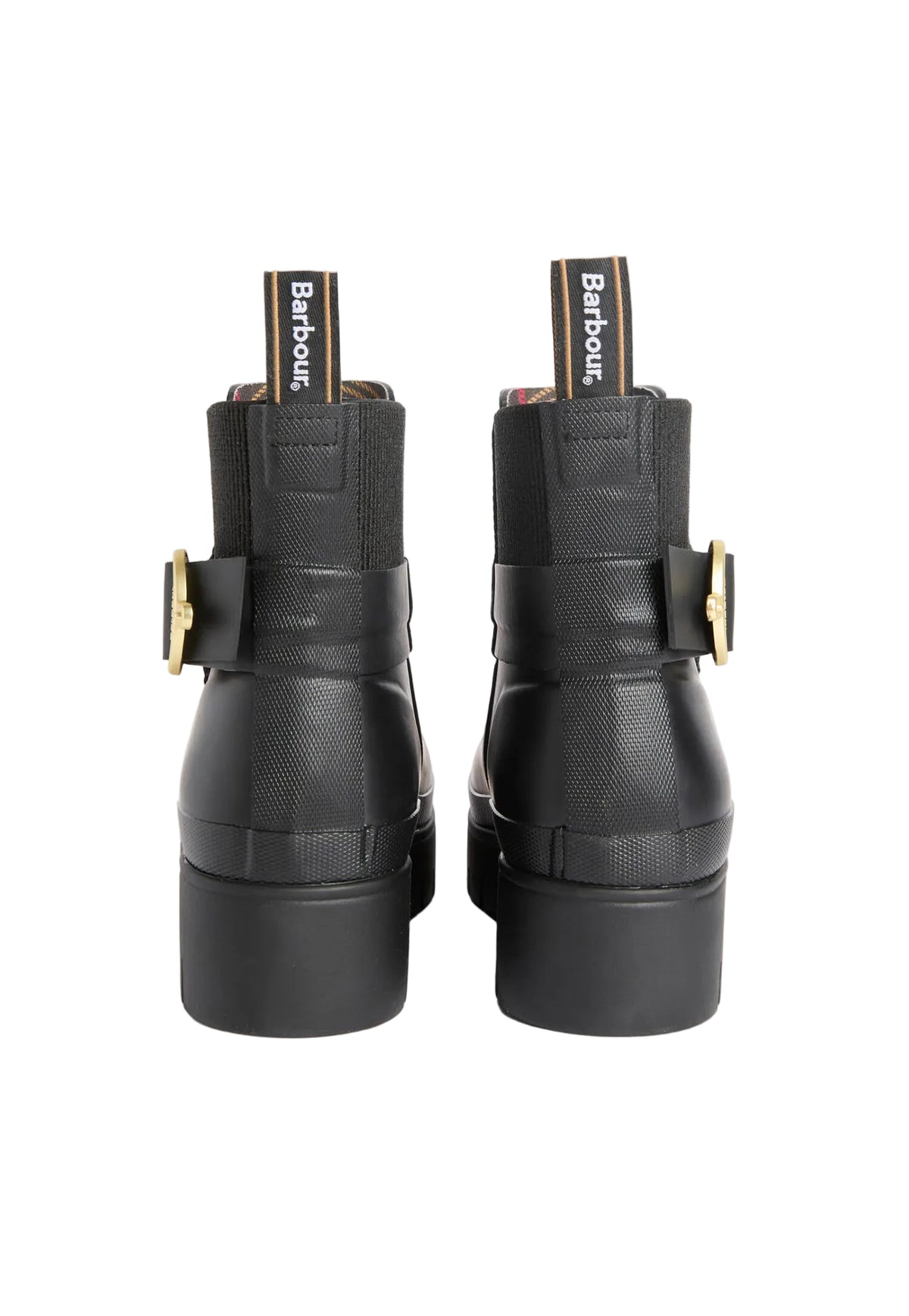 A pair of black Barbour ankle boots shown from the back, featuring textured leather panels, a wide strap with a gold buckle, and a thick black sole. The Barbour brand name is visible on the pull tabs.