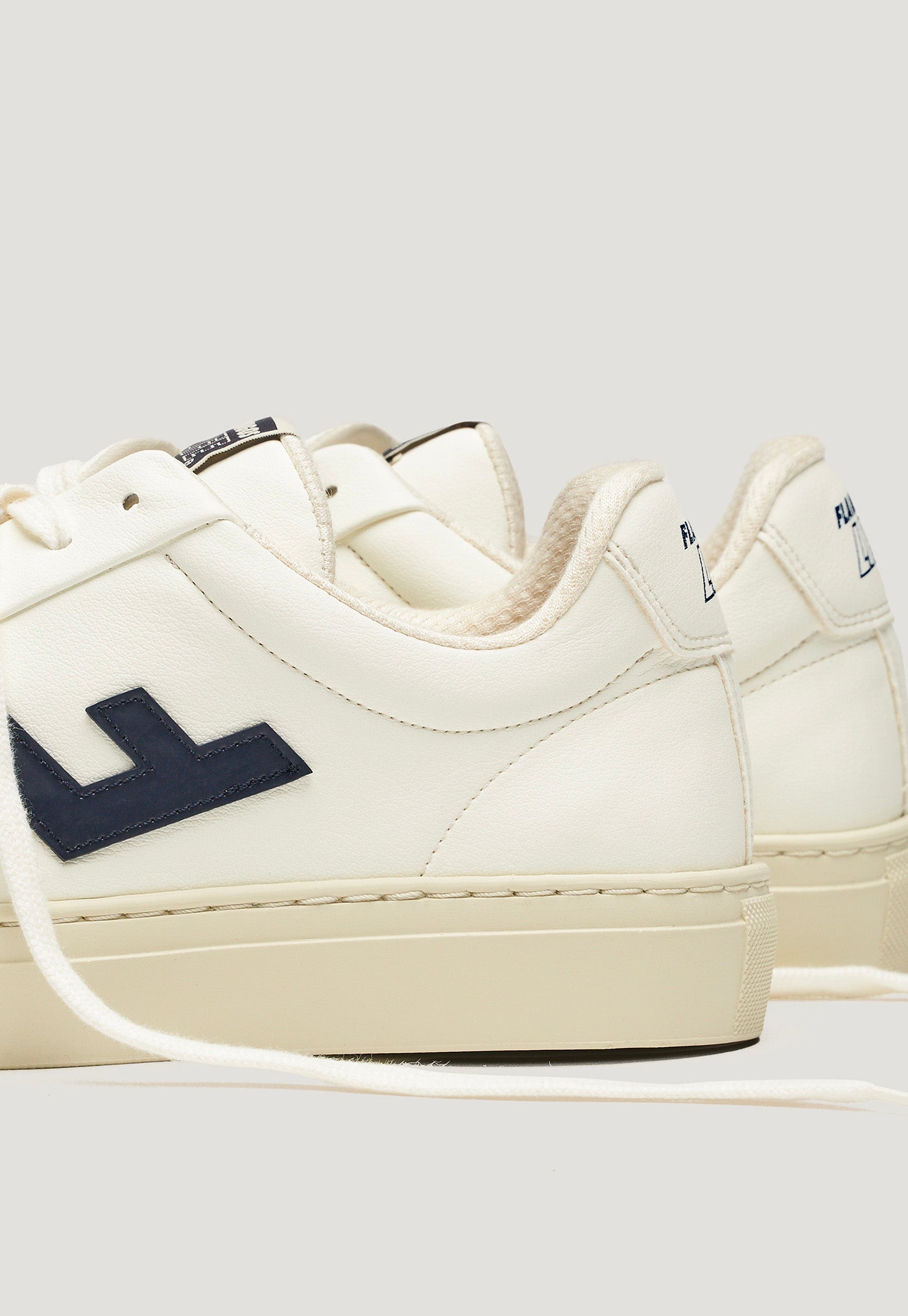 Classic 70s Sneakers - Off White Navy Ecru sold by Angel Divine