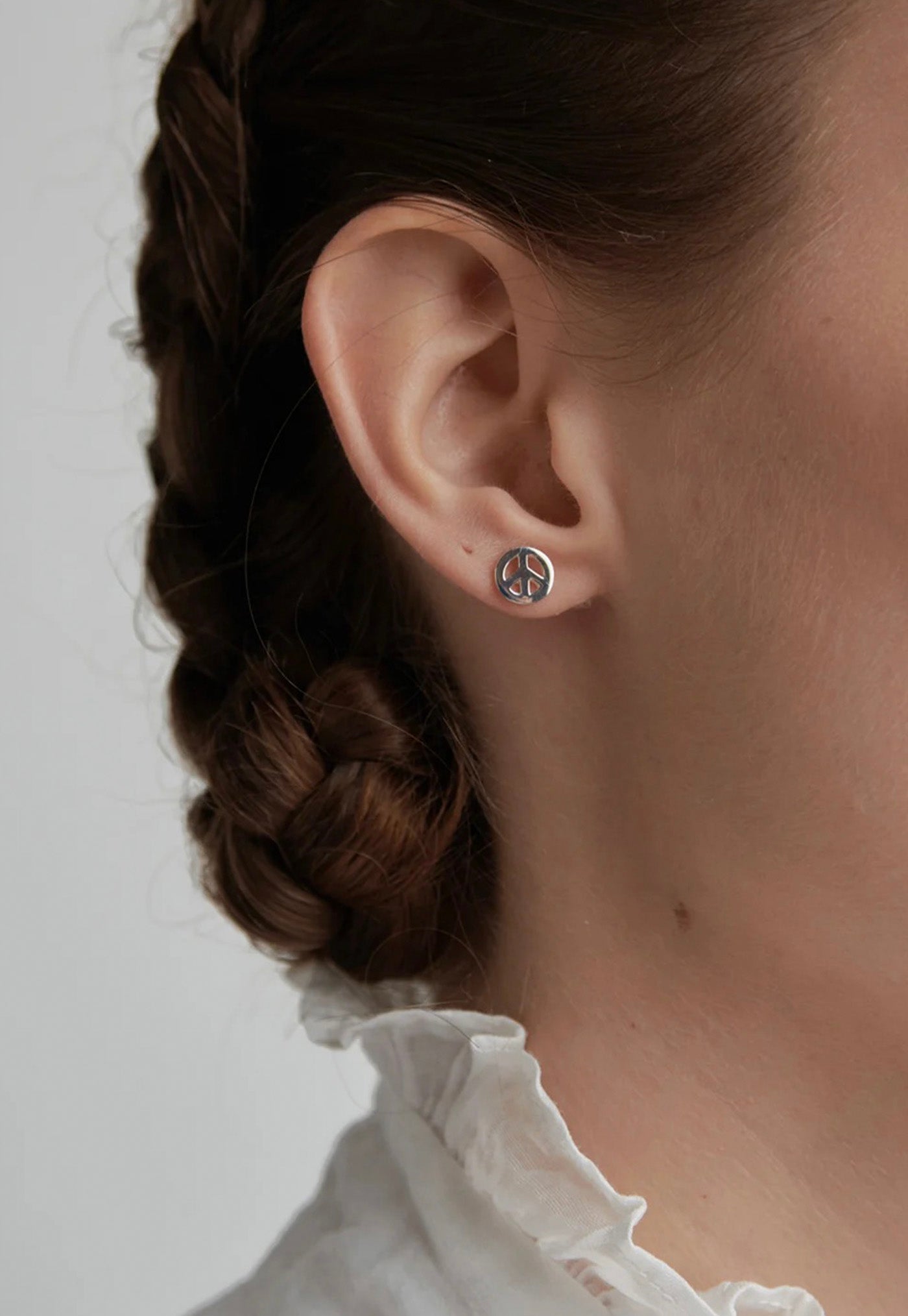Mini Peace Studs sold by Angel Divine