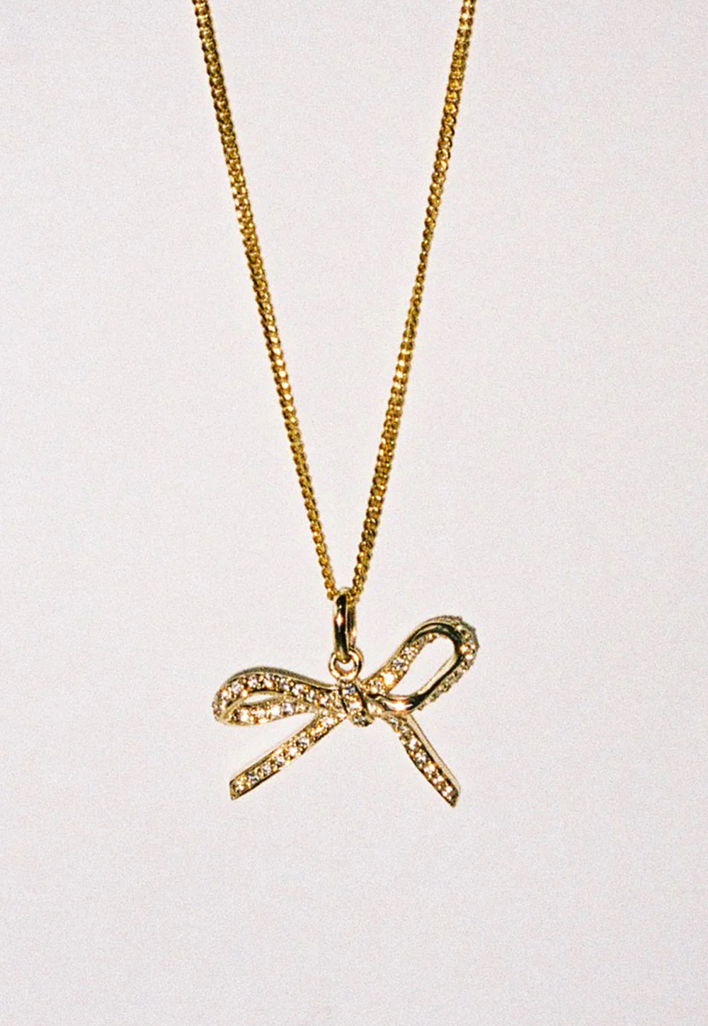 White Diamond Bow Necklace sold by Angel Divine