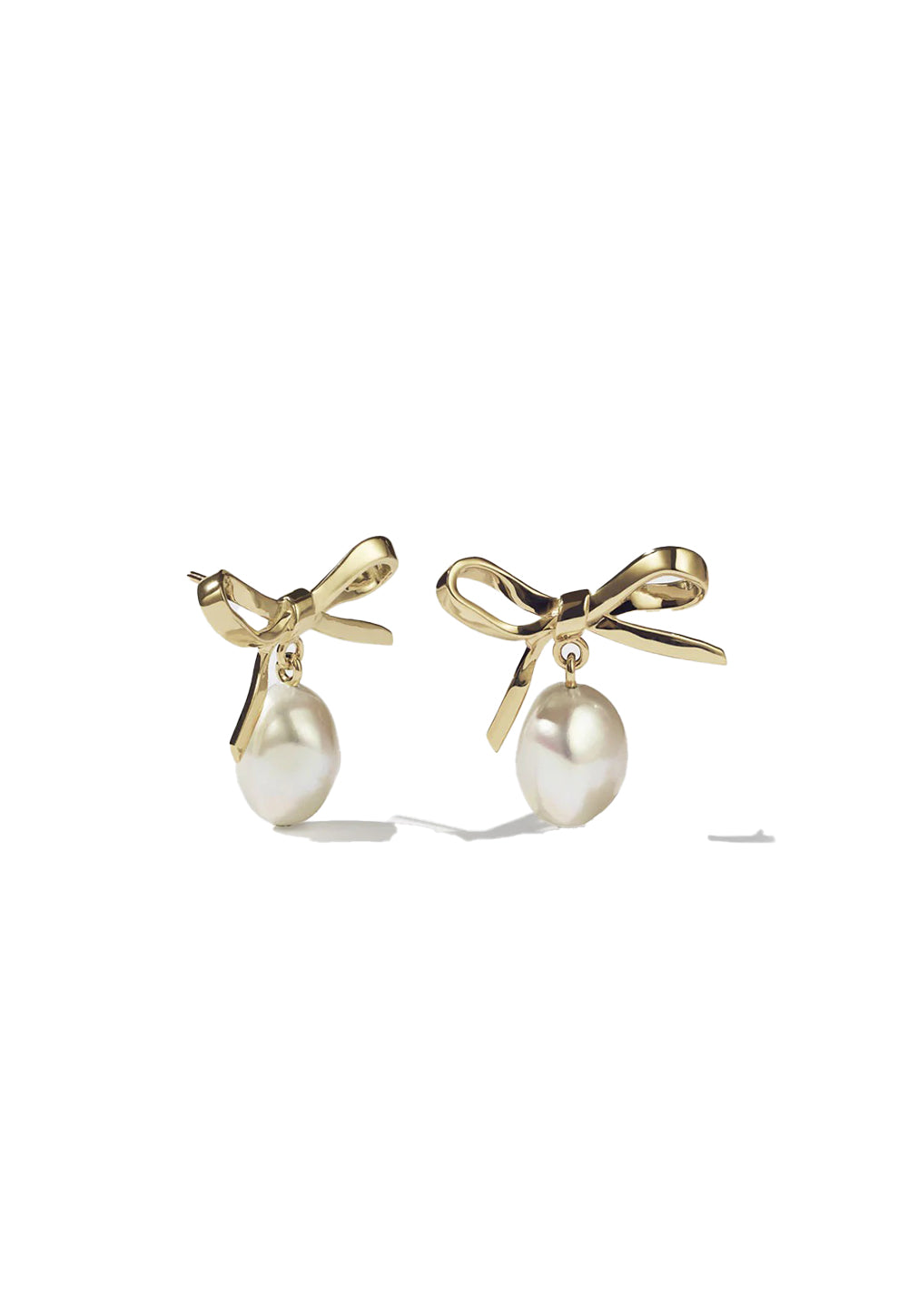 Bow Pearl Stud Earrings sold by Angel Divine