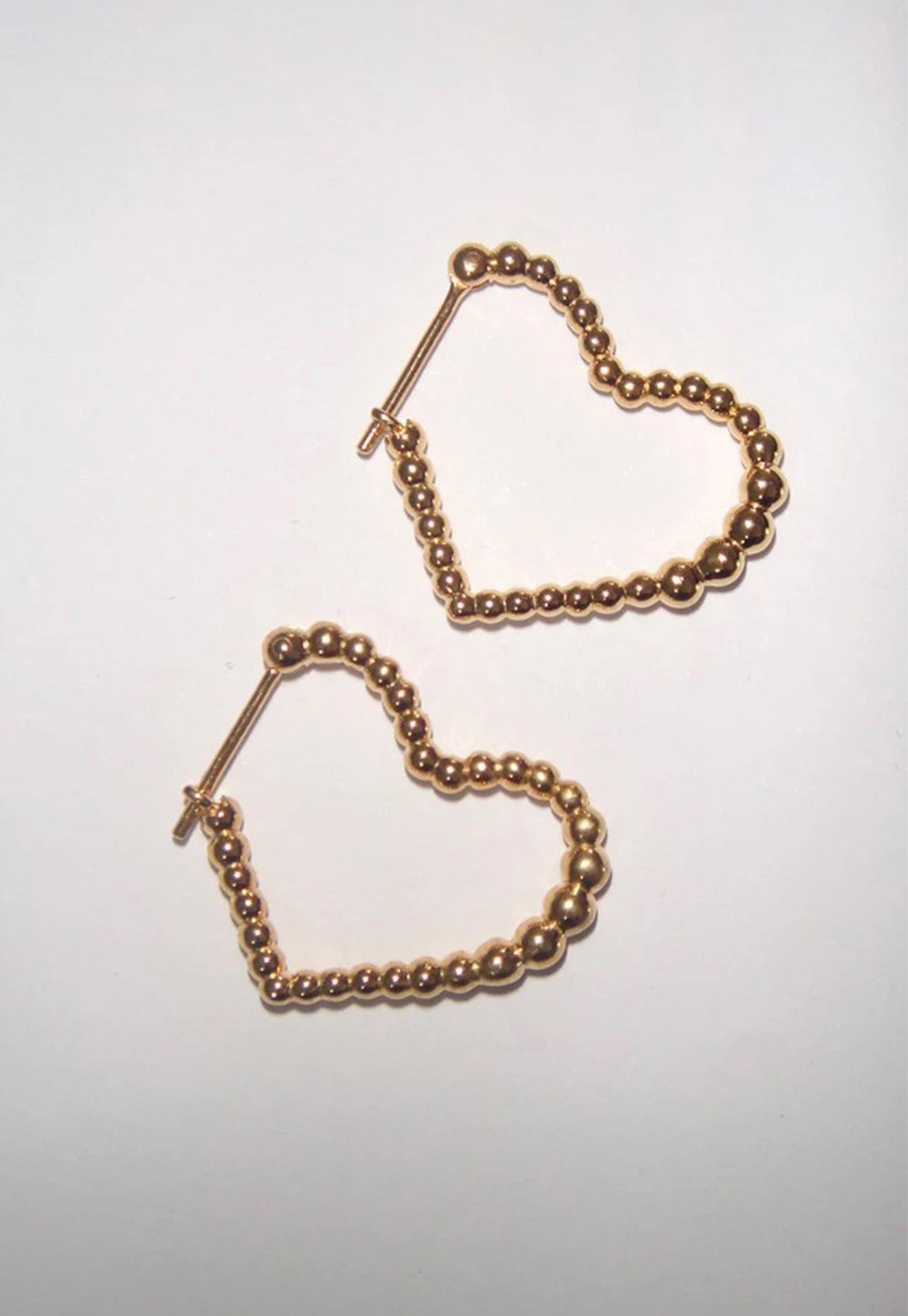 Fizzy Heart Hoops sold by Angel Divine