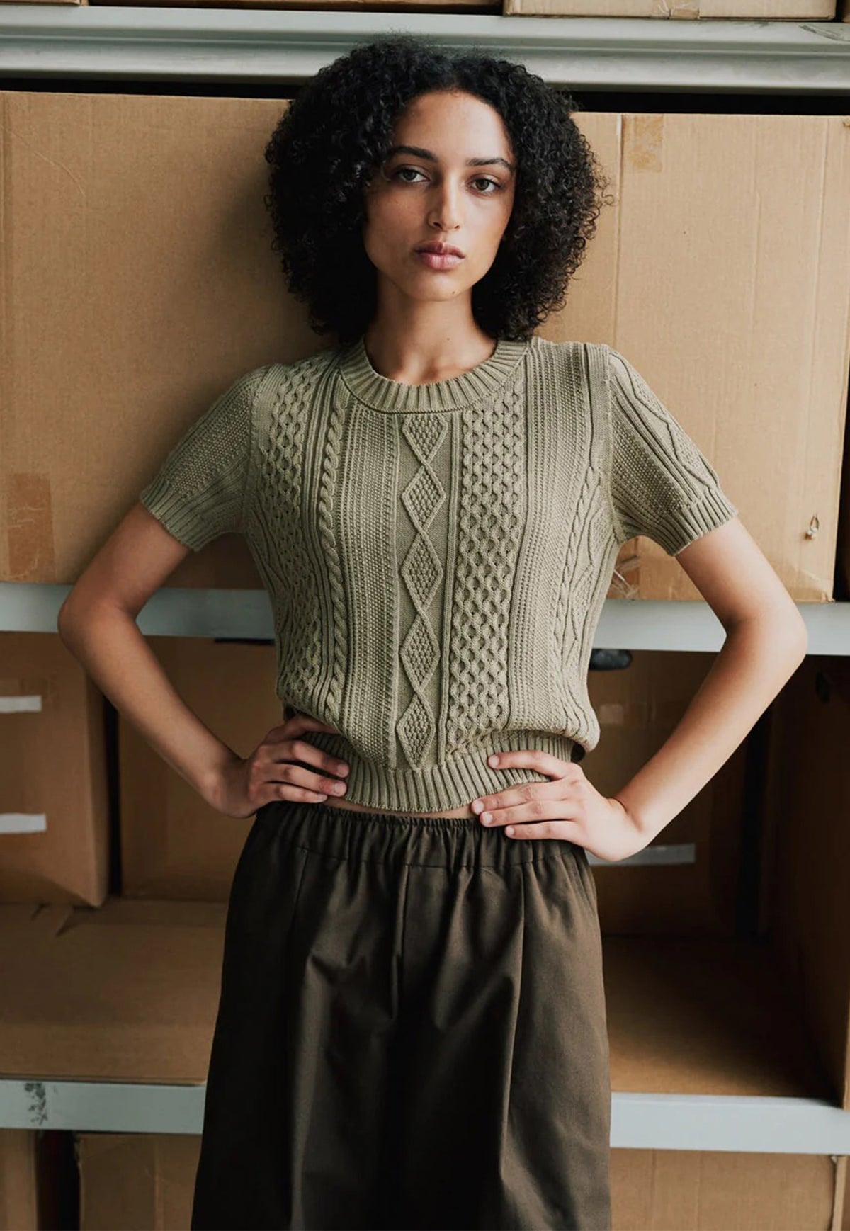 Standard Issue Cotton Cable Tshirt. A short-sleeve 100% cotton cable-knit sweater in a muted sage green.