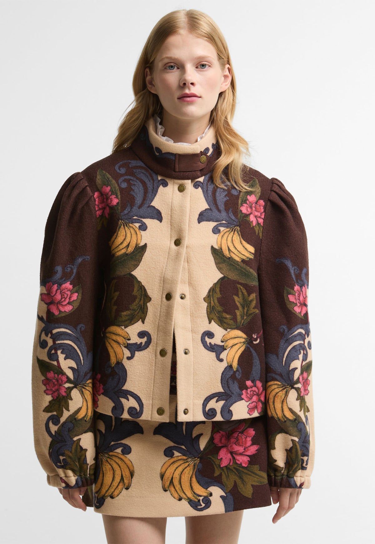 Barbour x FARM Rio Cardeiro Funnel Neck Jacket in Bloom In Between, a cream and brown floral banana print wool funnel neck jacket with branded studs.