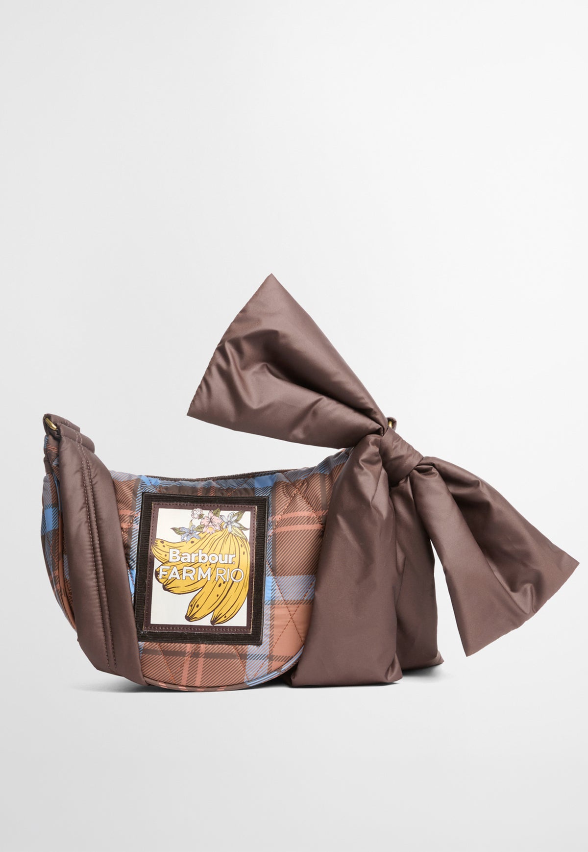 Barbour x FARM Rio Fernanda Sling Bag in Tropical Tea Tartan, tartan zip sling bag with padded shoulder strap and removable bow.