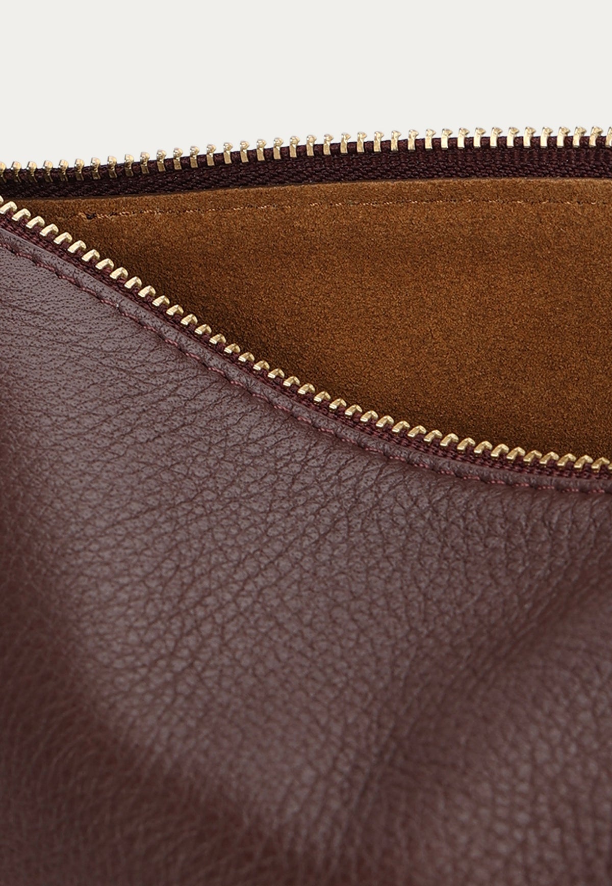 Deadly Ponies Medium Poucher in Dark Cherry featuring a calf suede lining and zipped opening.