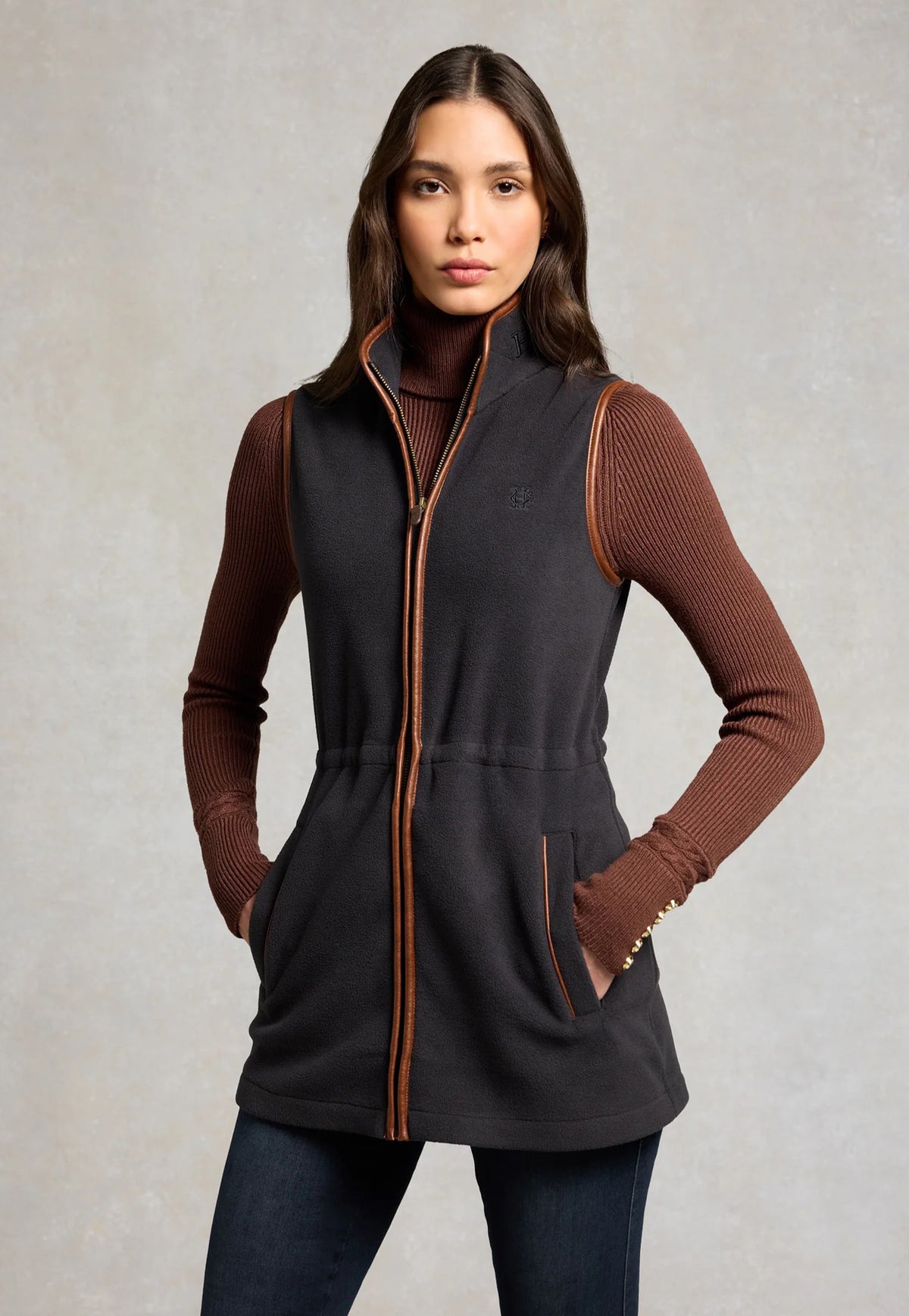 Holland Cooper Country Longline Fleece Gilet in Ink Navy, navy longline fleece gilet with faux leather back panel, quilted collar and HC chest embroidery.