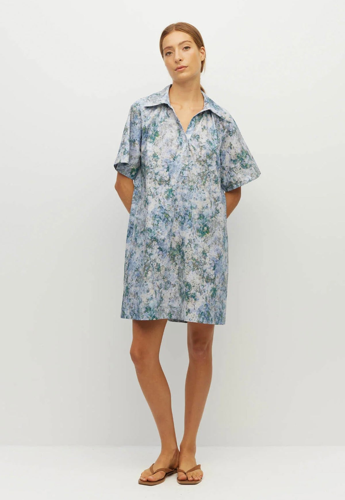 Juliette Hogan Rue Shirtdress in Cloud Flower Cotton Frosted Sky, relaxed printed cotton dress with collared neckline and elbow-length raglan sleeves.